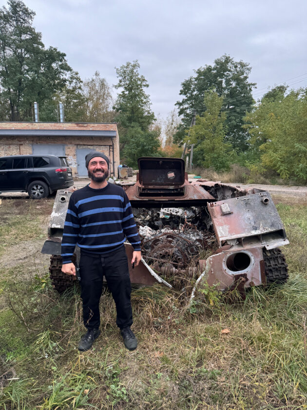 Nikko in front of a Russian tank